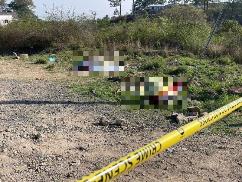 Escena del hallazgo donde fueron encontrados los cuerpos sin vida de Jafeth y Brayan Hernández, en la salida al sur de Tegucigalpa, capital de Honduras.