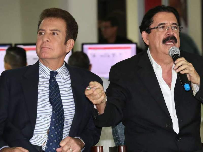 Salvador Nasralla y el expresidente Manuel Zelaya Rosales durante conferencia de prensa en la que denunciaron un fraude electoral tras las elecciones de noviembre de 2017.