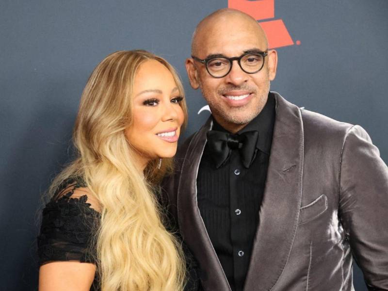 Mariah Carey posa junto a Harvey Mason jr., presidente y director ejecutivo de la Academia de la Grabación, en la alfombra roja del homenaje Persona del Año de MusiCares 2026, este viernes en Los Ángeles, California, EE.UU.
