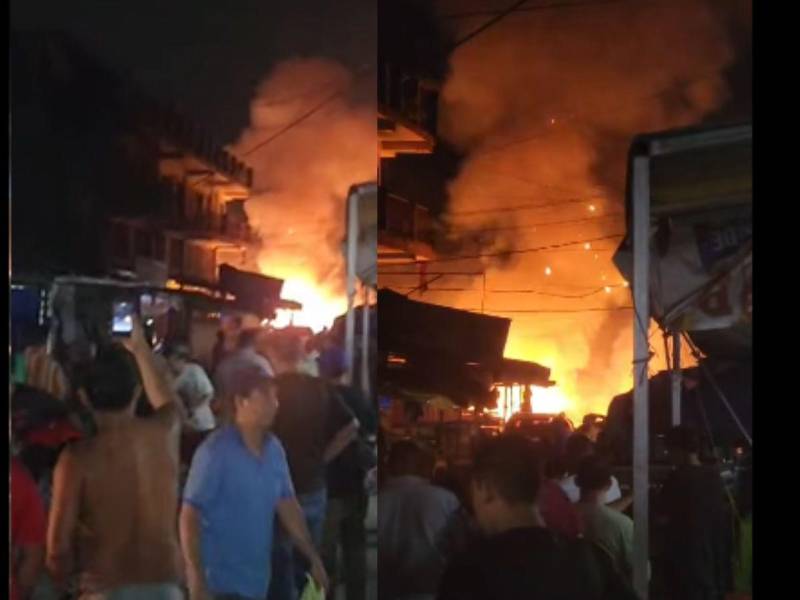 En redes sociales han circulado varios videos en los que se observa un incendio de grandes proporciones que consume varios locales del sector.