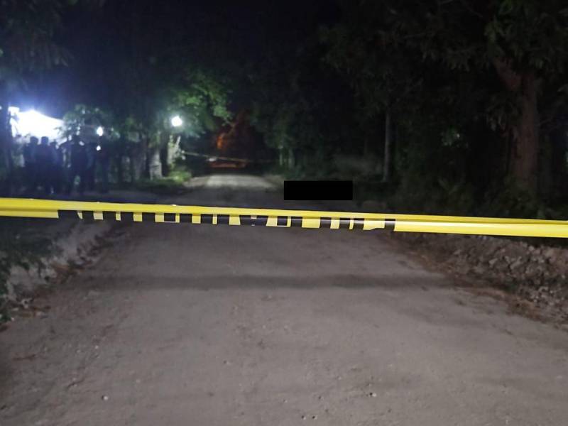 Escena donde fue encontrada asesinada una mujer en la colonia Cerrito Lindo de San Pedro Sula.