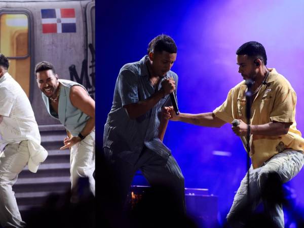 La noche del pasado domingo la lluvia azotó la ciudad de los zorzales, pero ni siquiera eso pudo impedir que el público esperara pacientemente para el show de Romeo Santos y Prince Royce, en el estadio Olímpico Metropolitano de esta ciudad.<b>En la imagen: </b>Romeo Santos y Prince Royce con dos catrachos que subieron para cantar y bailar con ellos.
