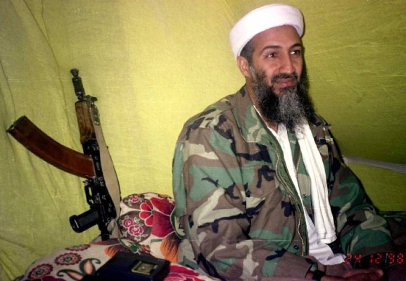 FILE - In this Dec. 24, 1998, file photo, Muslim militant and Al Quida leader Osama Bin Laden speaks to a selected group of reporters in mountains of Helmand province in southern Afghanistan. A person familiar with developments said Sunday, May 1, 2011 that bin Laden is dead and the U.S. has the body. (AP Photo/Rahimullah Yousafzai, File)