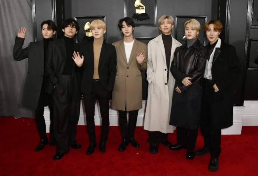 LOS ANGELES, CALIFORNIA - JANUARY 26: (L-R) RM, V, Suga, Jin, Jimin, Jungkook, and J-Hope of music group BTS attend the 62nd Annual GRAMMY Awards at STAPLES Center on January 26, 2020 in Los Angeles, California. Frazer Harrison/Getty Images for The Recording Academy/AFP