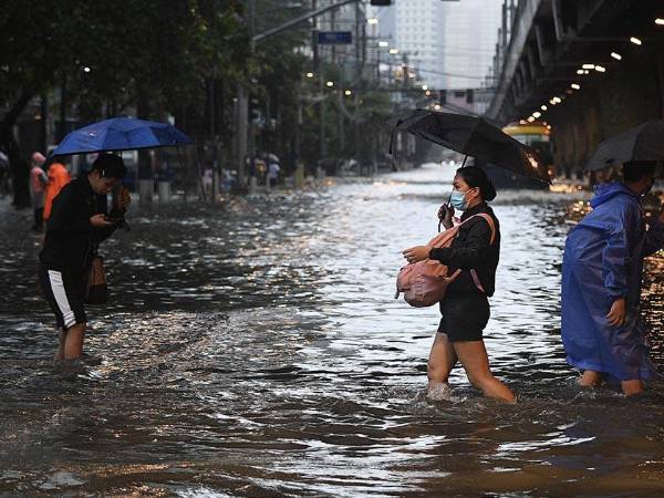 Las naciones más ricas y más pobres discrepan sobre lo justo de los esfuerzos contra el cambio climático. Manila en 2024. (Ted Aljibe/Agence France-Presse — Getty Images)