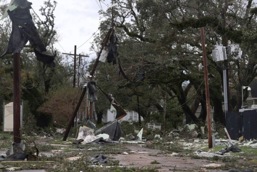 LAKE CHARLES, LOUISIANA - AUGUST 27: A street is seen strewn with debris and downed power lines after Hurricane Laura passed through the area on August 27, 2020 in Lake Charles, Louisiana . The hurricane hit with powerful winds causing extensive damage to the city. Joe Raedle/Getty Images/AFP<br/><br/>== FOR NEWSPAPERS, INTERNET, TELCOS & TELEVISION USE ONLY ==<br/><br/>
