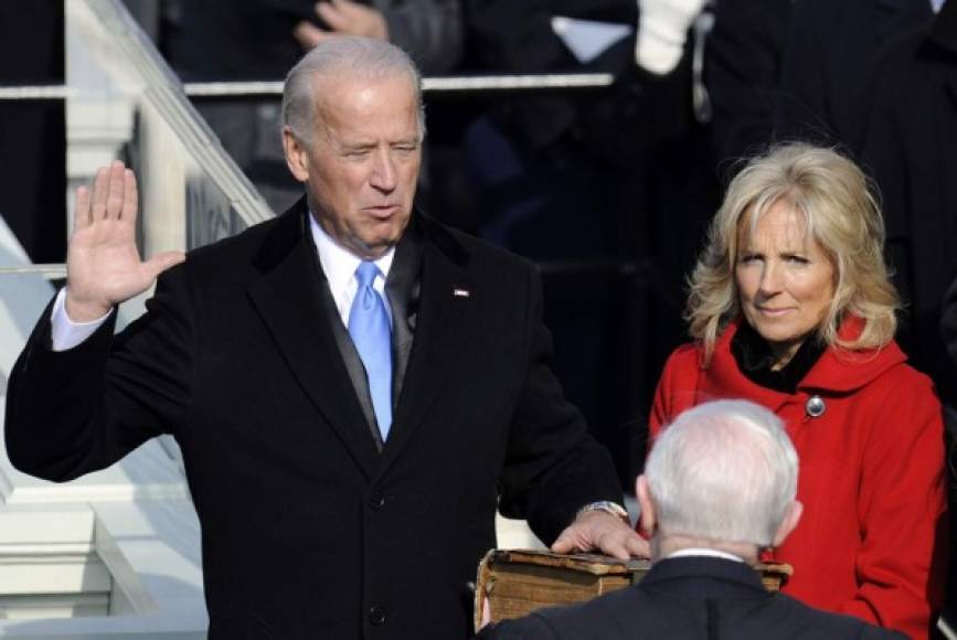 (FILES) In this file photo taken on January 20, 2009, Joe Biden is sworn in as US Vice President beside his wife Jill Biden during the inaugural ceremonies at the US Capitol in Washington. - Jill Biden is no stranger to the glare of the political spotlight. Her husband has been a Washington insider since they wed in 1977, and she was America's second lady for eight years. But if Joe Biden wins the White House, his 69-year-old wife will have the opportunity to push the role of first lady into the 21st century -- by keeping her full-time job as a professor. 'Most American women have both a work life and a family life, but first ladies have never been allowed to do so,' said Katherine Jellison, a history professor at Ohio University. (Photo by Timothy A. CLARY / AFP)