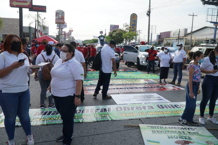 Marcha del Día del Trabajador en San Pedro Sula. Fotos: José Cantarero / La Prensa
