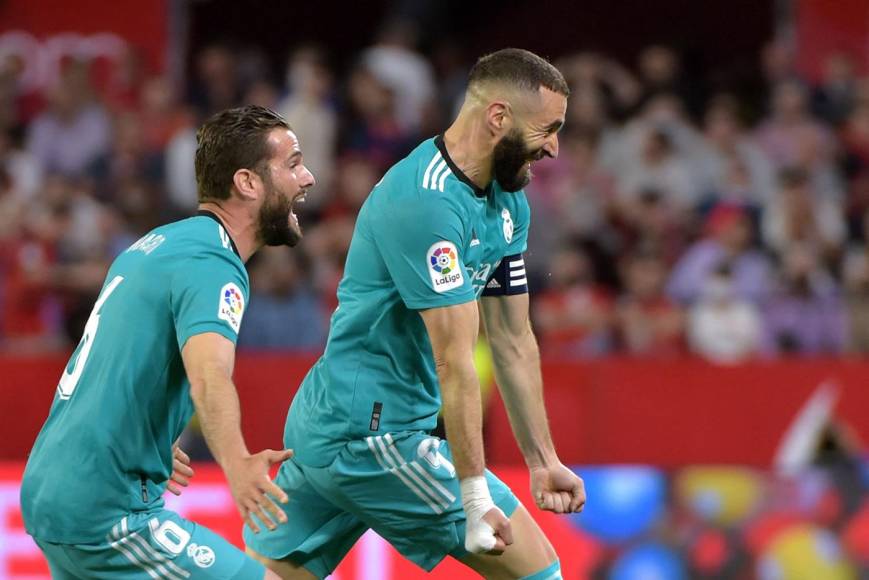 La alegría de Benzema y Nacho tras el gol de la remontada.