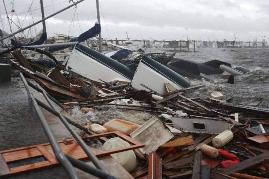 PANAMA CITY, FL - OCTOBER 10: Boats that were docked are seen in a pile of rubble after hurricane Michael passed through the downtown area on October 10, 2018 in Panama City, Florida. The hurricane hit the Florida Panhandle as a category 4 storm. Joe Raedle/Getty Images/AFP