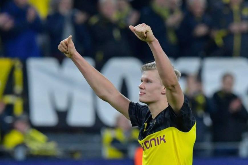 Dortmund's Norwegian forward Erling Braut Haaland celebrates after the UEFA Champions League Last 16, first-leg football match BVB Borussia Dortmund v Paris Saint-Germain (PSG) in Dortmund, western Germany, on February 18, 2020. (Photo by Tobias SCHWARZ / AFP)