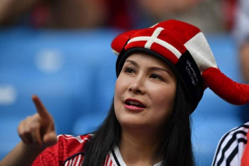 A Denmark fan gestures in the crowd before kick off of the Russia 2018 World Cup Group C football match between Denmark and Australia at the Samara Arena in Samara on June 21, 2018. / AFP PHOTO / Fabrice COFFRINI / RESTRICTED TO EDITORIAL USE - NO MOBILE PUSH ALERTS/DOWNLOADS