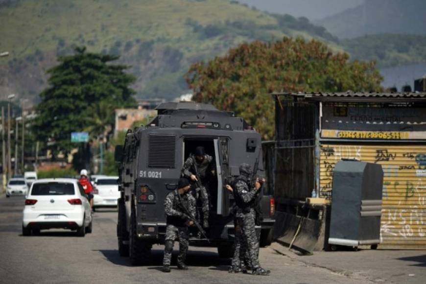 24 de los 25 fallecidos son narcotraficantes. (Photo by Mauro Pimentel / AFP)