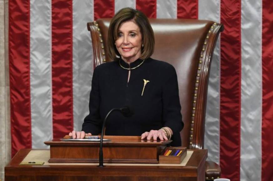 US Speaker of the House Nancy Pelosi presides over Resolution 755, Articles of Impeachment Against President Donald J. Trump as the House votes at the US Capitol in Washington, DC, on December 18, 2019. (Photo by SAUL LOEB / AFP)