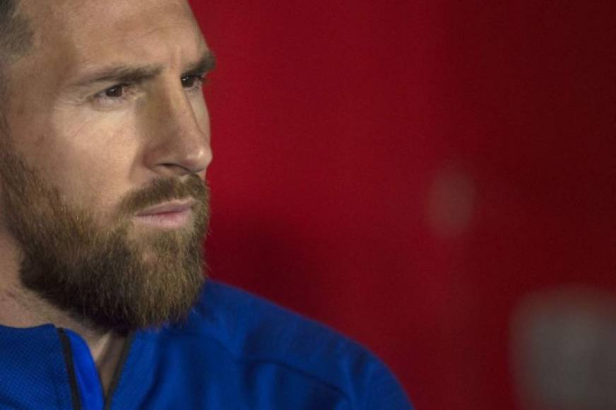 (FILES) In this file photo taken on September 21, 2019 Barcelona's Argentinian forward Lionel Messi looks on before the Spanish league football match between Granada FC and FC Barcelona at Nuevo Los Carmenes stadium in Granada. - Lionel Messi will end his 20-year career with Barcelona after the Argentine superstar failed to reach agreement on a new deal with the club, the Spanish giants announced on August 5, 2021. (Photo by JORGE GUERRERO / AFP)