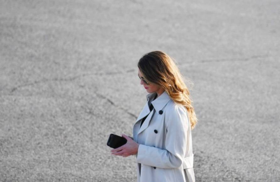 (FILES) In this file photo taken on September 21, 2020 Hope Hicks is seen as US President Donald Trump speaks during a rally at Dayton International Airportin Dayton, Ohio. - Hope Hicks, one of President Donald Trump's closest aides, has tested positive for the coronavirus. Hicks, who serves as counselor to the president and traveled with him to a Wednesday rally, tested positive Thursday, according to an administration official, who spoke on condition of anonymity to discuss private health information. She is the closest aide to Trump to test positive so far. (Photo by MANDEL NGAN / AFP)