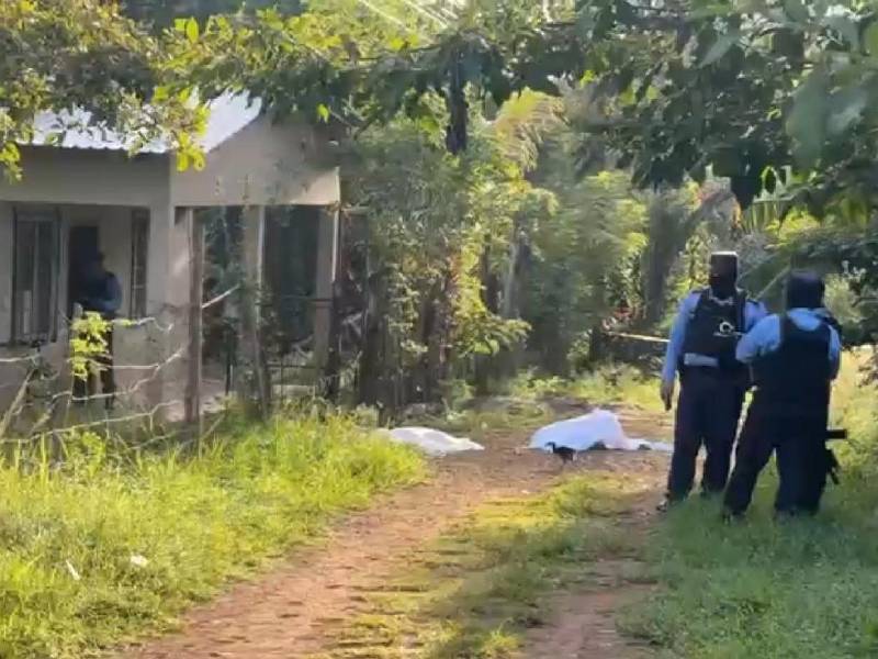 Escena del crimen donde murieron padre e hijo en Santa Cruz de Yojoa.