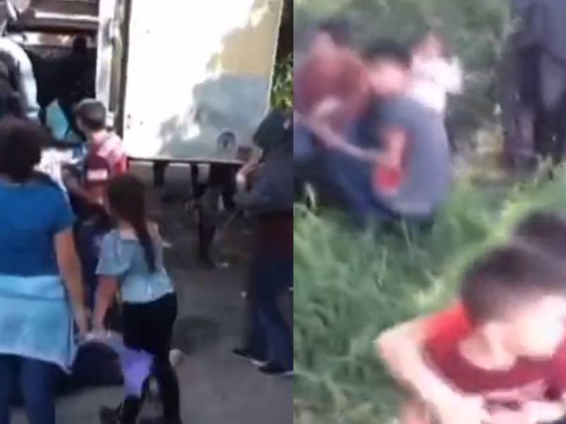 Imagen de los migrantes cuando son bajados del tráiler.