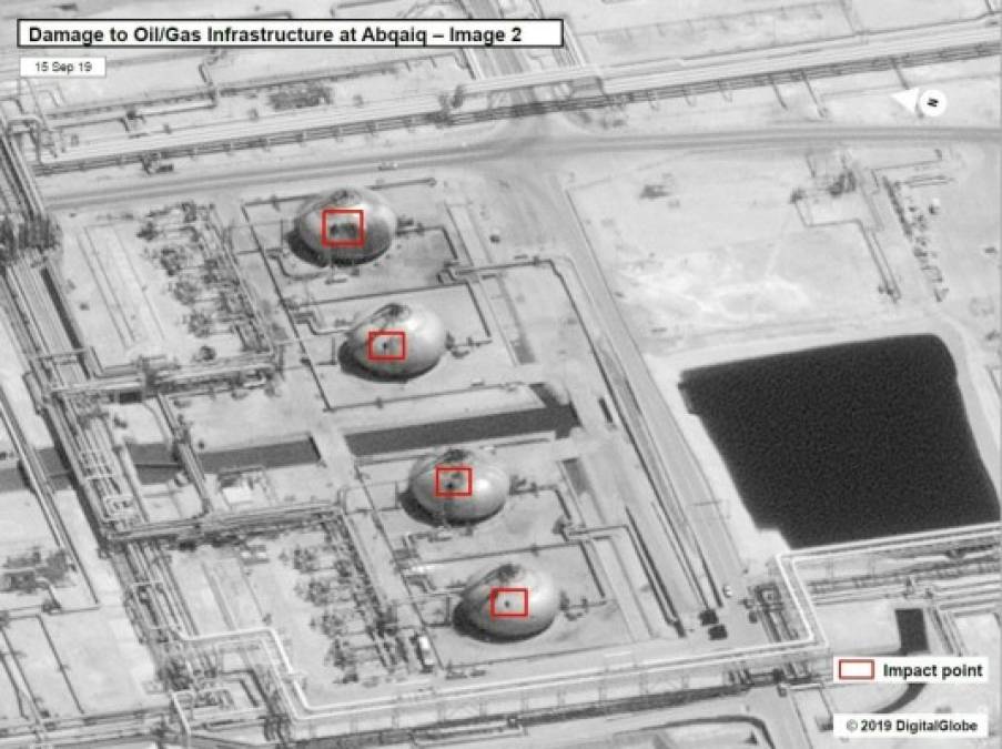This satellite overview handout image obtained September 16, 2019 courtesy of the US Government shows damage to oil/gas infrastructure from weekend drone attacks at Abqaig on September 15, 2019 in Saudi Arabia. - Drone attacks on key Saudi oil facilities have halved crude output from OPEC's biggest exporter, catapulting oil prices by the largest amount since the first Gulf War. The crisis has focused minds on unrest in the crude-rich Middle East, with Tehran denying Washington's charge that it was responsible.Brent oil prices leapt 20 percent on Monday to chalk up the biggest intra-day daily gain since 1991. (Photo by HO / US Government / AFP) / RESTRICTED TO EDITORIAL USE - MANDATORY CREDIT 'AFP PHOTO /US GOVERNMENT/HANDOUT ' - NO MARKETING - NO ADVERTISING CAMPAIGNS - DISTRIBUTED AS A SERVICE TO CLIENTS