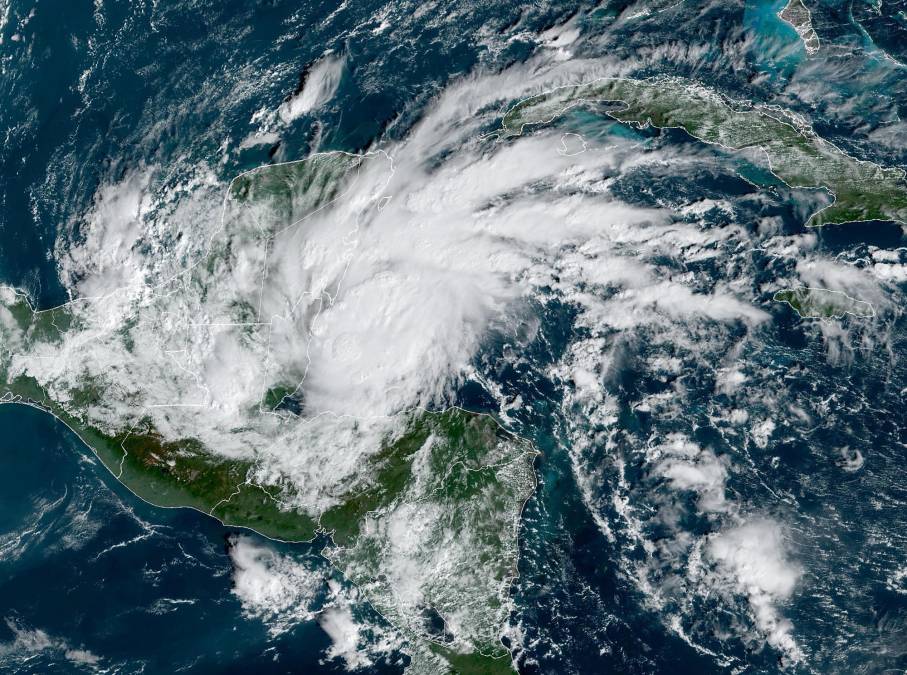 This satellite image obtained from the National Oceanic and Atmospheric Administration shows Hurricane Lisa approaching the Yucatan Peninsula on November 2, 2022, at 14:30UTC. - The northern part of Central America was on high alert November 2 for the passage of Hurricane Lisa, with warnings of devastating winds, downpours and flash floods also affecting Mexico's Yucatan peninsula. The US National Hurricane Center has issued a hurricane warning for Honduras' Bay Islands, the coast of Belize and Mexico's Yucatan area stretching from Chetumal to Puerto Costa Maya. (Photo by Handout / NOAA/GOES / AFP)