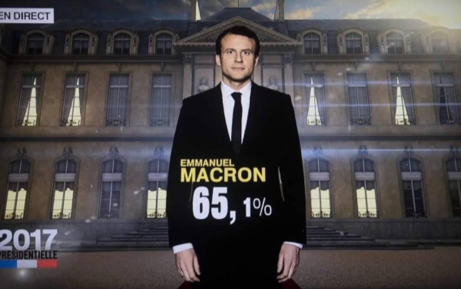 Los resultados electorales tal como fueron presentados en la televisión francesa, en una captura que muestra que Macron obtuvo más del 60% de los votos.