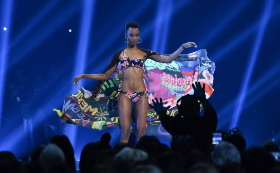 Miss South Africa Zozibini Tunzi competes in the swimsuit category during the 2019 Miss Universe pageant at the Tyler Perry Studios in Atlanta, Georgia on December 8, 2019. (Photo by VALERIE MACON / AFP)
