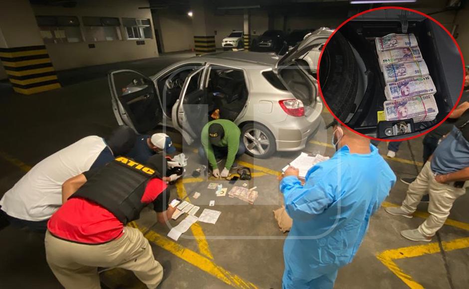 Detienen a hombres que llevaban ocultos L2.2 millones en baúl de carro