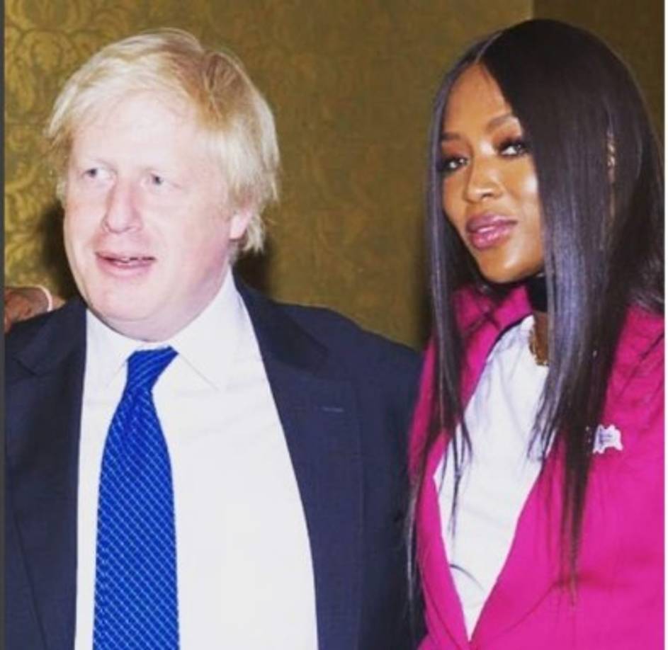 En la imagen, Johnson y Naomi Campbell durante una reunión sobre educación y pobreza.