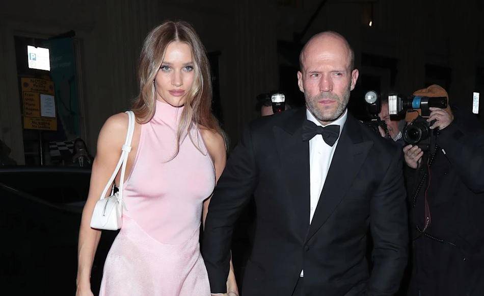 La modelo Rosie Alice Huntington-Whiteley y su pareja, el actor Jason Statham. 