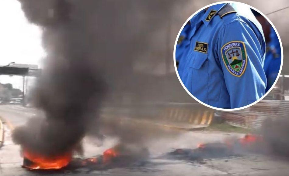 Policías depurados se toman carretera salida al norte de Tegucigalpa