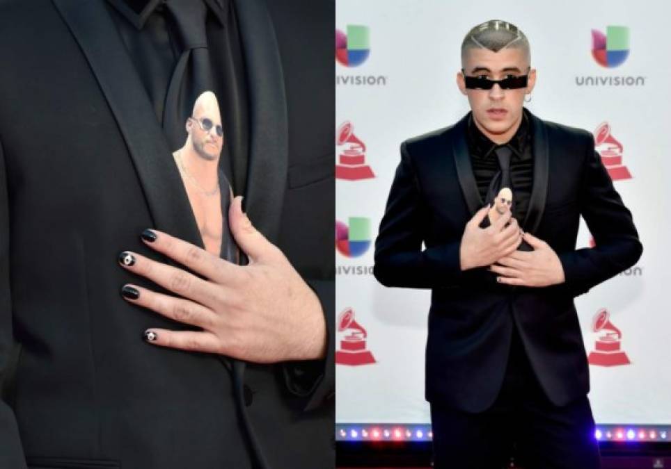 Bad Bunny está en esta lista porque esa corbata fue elegida con las peores intenciones. Miren como pone sus bien pintadas manitos sobre ella.