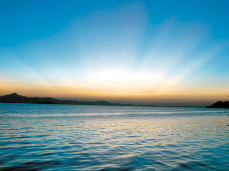 Jamaica's Usain Bolt celebrates after winning the men's 200m final at the National stadium as part of the 2008 Beijing Olympic Games on August 20, 2008. Bolt broke the men's 200 metres world record here on Wednesday timing 19.30 seconds as he clinched the Olympic Games gold to add to his 100m crown. AFP PHOTO / GABRIEL BOUYS