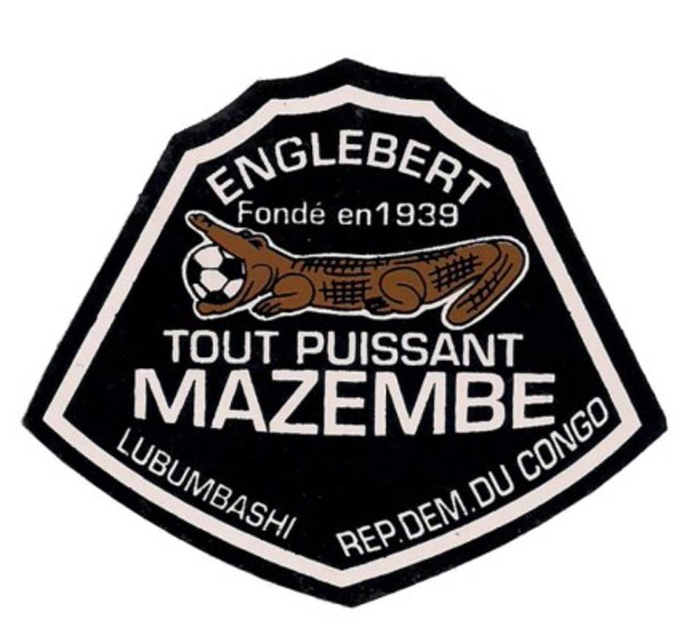 Mazembe. Este cuadro del Congo es representado por un curioso Cocodrilo que muerde un balón.