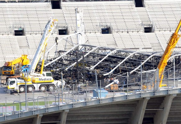 (FILES) In this file photo taken on July 29, 2009, shows the Marseille's Velodrom Stadium after the collapse of a stage set up for a Madonna concert in wihch two stage hands setting up the Madonna concert earlier this month. - Eleven years later, the court case of the deadly collapse of the stage which was to host a music concert by pop star Madonna in the southern city of Marseille will open on October 5, 2020. (Photo by MICHEL GANGNE / AFP)